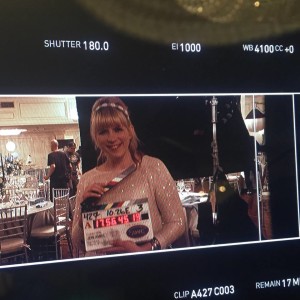 Rebecca Fox with a slate on the set of The Astronauts Wives Club